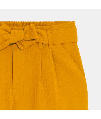 Girls' plain yellow belted shorts