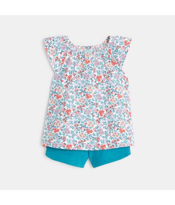 Baby girl's floral blouse and blue shorts