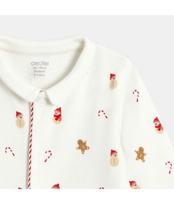 White interlock gingerbread pattern sleepsuit