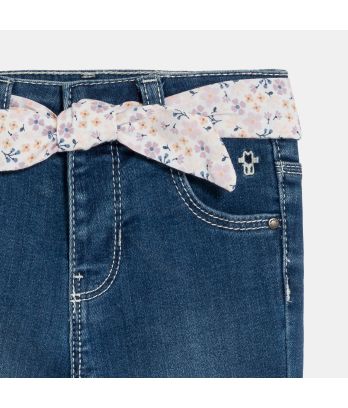 Baby girl's blue jeans with floral belt