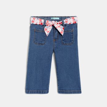 Baby girl's blue denim wide-legged jeans with floral belt
