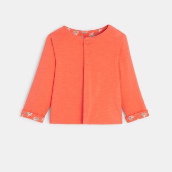 Baby girl's orange reversible printed sweatshirt with press-studs