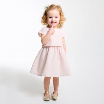 Girl's elegant shiny pink linen dress