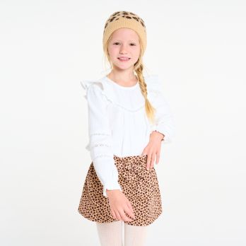 Girl's white cotton gauze blouse with ruffles