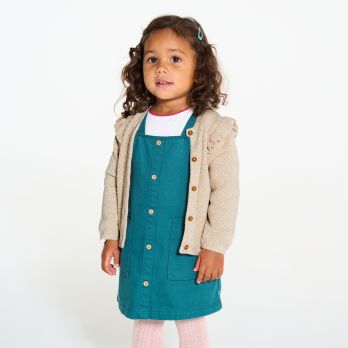 Baby girl's beige knitted cardigan with ruffle