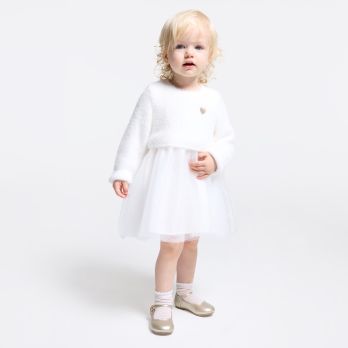 Baby girl’s white bi-material dress with sleeves
