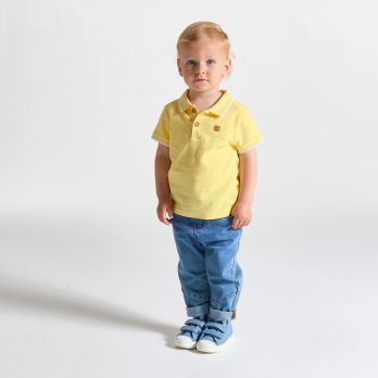 Baby boy's yellow piqué polo shirt