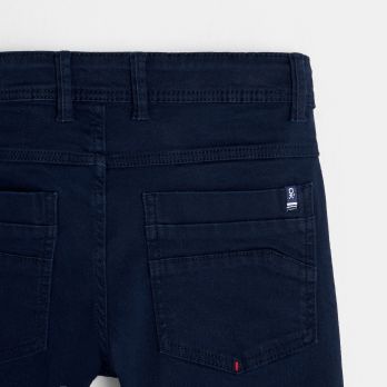 Boy's slim-fit blue Bermuda shorts in very stretchy canvas 